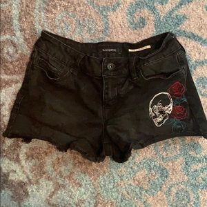 Low rise black jean shorts